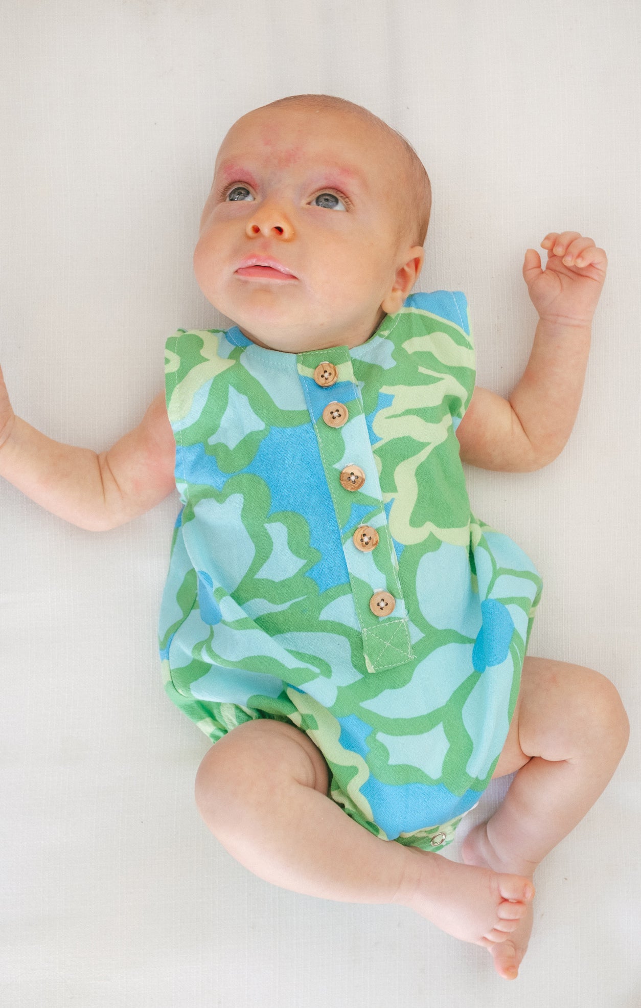 Abstract Poppy Baby Onesie with Easy Neck Buttons | Rowan