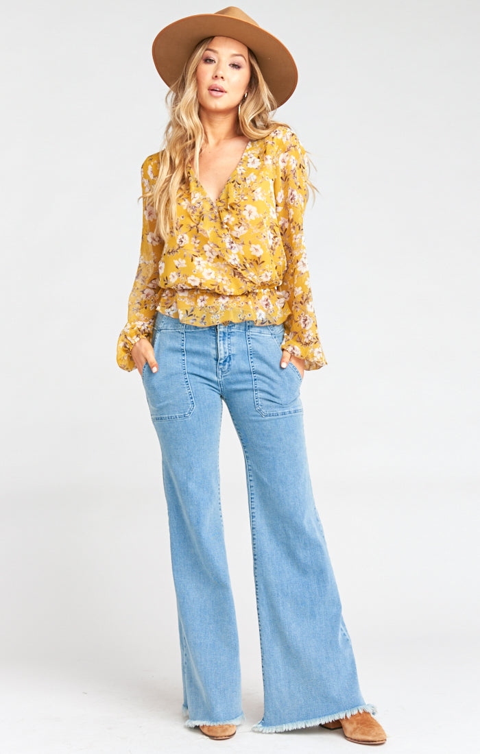 Long Sleeve Floral Peplum Top with Deep V Neck | Brewster